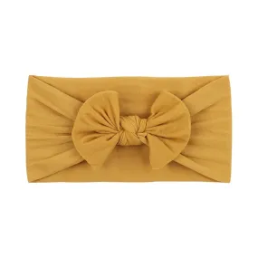 Soft Solid Colour Nylon Baby Headband in Mustard